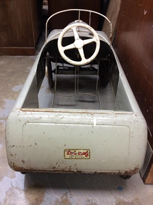 Lot 1230 - Vintage 1950's Tri-ang pedal car in original unrestored condition with original paint and decals, 92cm overall length