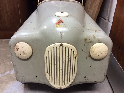 Lot 1230 - Vintage 1950's Tri-ang pedal car in original unrestored condition with original paint and decals, 92cm overall length