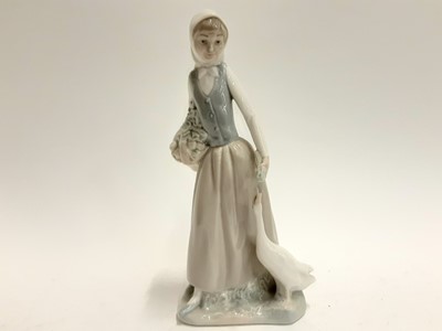 Lot 399 - Nao porcelain figure - lady with goose, and other decorated china and ornaments - 1 shelf