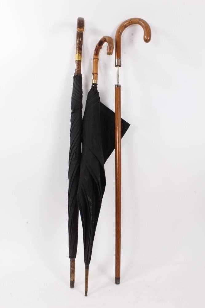 Lot 807 - Edwardian sword stick with rectangular tapered blade and two 1930s umbrellas (3)