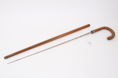 Lot 807 - Edwardian sword stick with rectangular tapered blade and two 1930s umbrellas (3)