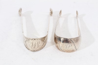 Lot 503 - Pair of George III Irish silver sugar tongs, and a pair of Scottish Provincial silver sugar tongs