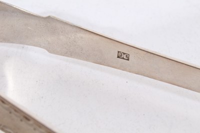 Lot 503 - Pair of George III Irish silver sugar tongs, and a pair of Scottish Provincial silver sugar tongs