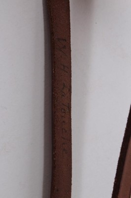 Lot 878 - 20th century turned wood police truncheon with ribbed grip and brown leather strap stamped Hiatt's. B.ham, named in ink W. H. La Touche, 38cm in length