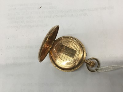 Lot 713 - Late 19th century Swiss 18ct gold fob watch with enamel dial in engraved gold case. 32mm diameter.