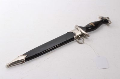 Lot 968 - Composite Nazi SS model 1933 dagger, later painted wooden grip and insignia, the blade etched 'Meine Ehre heist True', in black painted scabbard with nickel mounts.