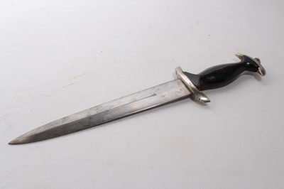 Lot 968 - Composite Nazi SS model 1933 dagger, later painted wooden grip and insignia, the blade etched 'Meine Ehre heist True', in black painted scabbard with nickel mounts.