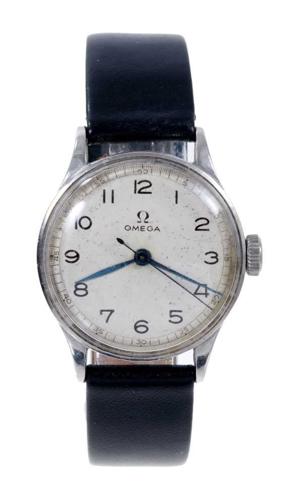 Lot 602 - 1940s gentlemen's Omega stainless steel wristwatch with manual wind Omega 15 jewel 23.4SC T1 calibre movement, numbered 9765017, the circular silvered dial with centre seconds and blued steel hands...
