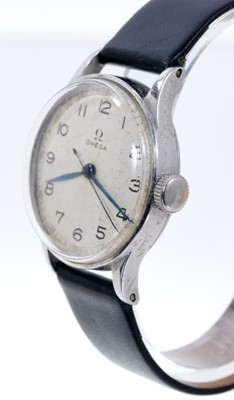 Lot 602 - 1940s gentlemen's Omega stainless steel wristwatch with manual wind Omega 15 jewel 23.4SC T1 calibre movement, numbered 9765017, the circular silvered dial with centre seconds and blued steel hands...