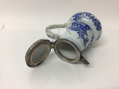 Lot 2 - Chinese Kangxi porcelain jug and cover with later silver mount, together with a bowl (2)