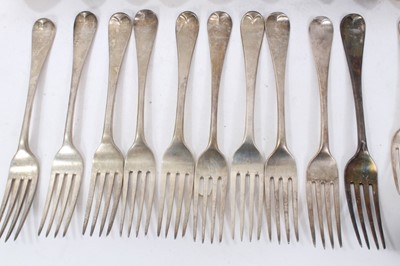 Lot 201 - Composite set of early 19th century Old English pattern flatware, with armorial crest. 32 pieces.