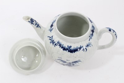 Lot 22 - Rare Worcester small strap-fluted teapot and cover, circa 1755, painted in blue with the Fisherman and Willow Pavilion pattern, workman's mark to base, 11cm high