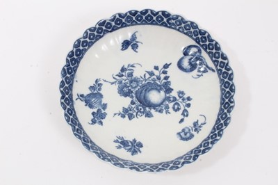 Lot 27 - Caughley tea bowl and saucer, circa 1780, of fluted form, printed in blue with the 'Apple' pattern, the saucer measuring 12.75cm diameter