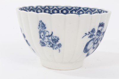 Lot 27 - Caughley tea bowl and saucer, circa 1780, of fluted form, printed in blue with the 'Apple' pattern, the saucer measuring 12.75cm diameter