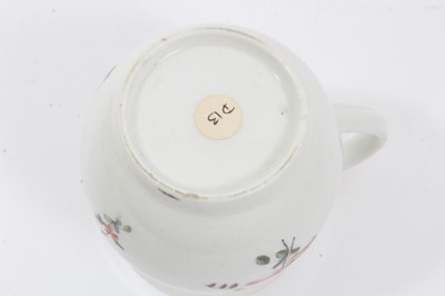 Lot 32 - Derby baluster shaped mug, circa 1760, polychrome painted with floral sprays, red painted rim, 10cm high
