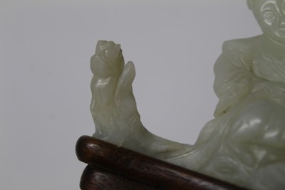 Lot 784 - Good Chinese carved jade figure, together with a carved jade bi-disc