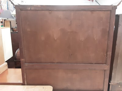 Lot 1025 - Early 20th century oak bookcase/display cabinet with shelved interior enclosed by two tinted and leaded glazed doors, single drawer below on spiral twist supports, 125cm wide, 41cm deep, 181.5cm hi...