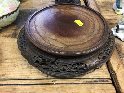 Lot 14 - Three good carved wood Chinese stands and a Chinese carved wood figure converted to a lamp