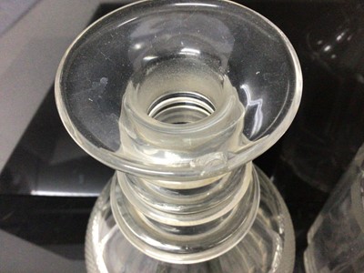 Lot 56 - Two Georgian cut glass ring neck decanters